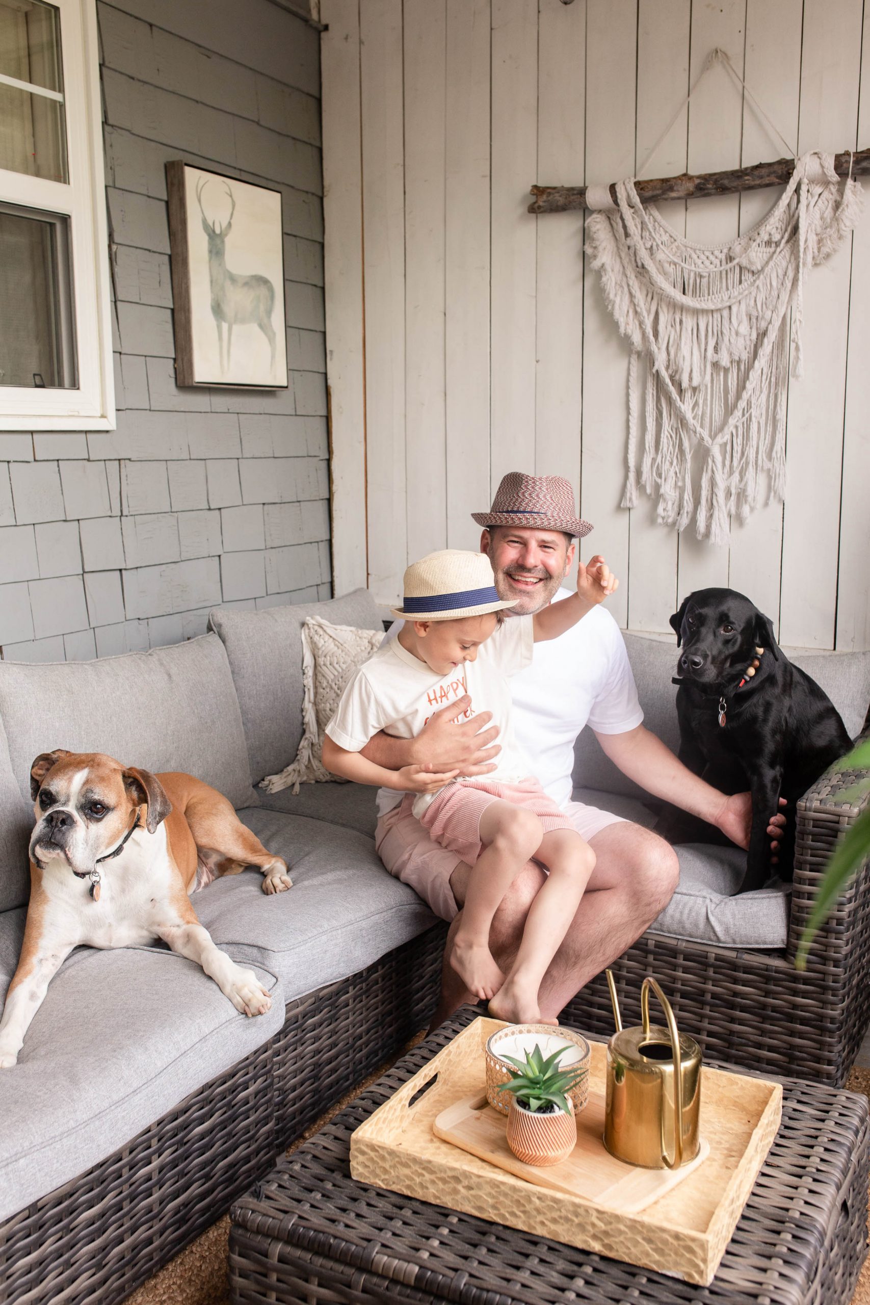 Ryan Jespersen with son and his dogs 